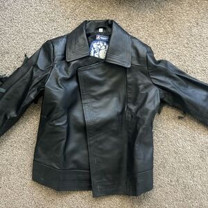black fringe-trim leather motorcycle jacket